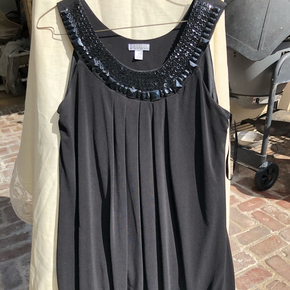 Dress tapers at thigh